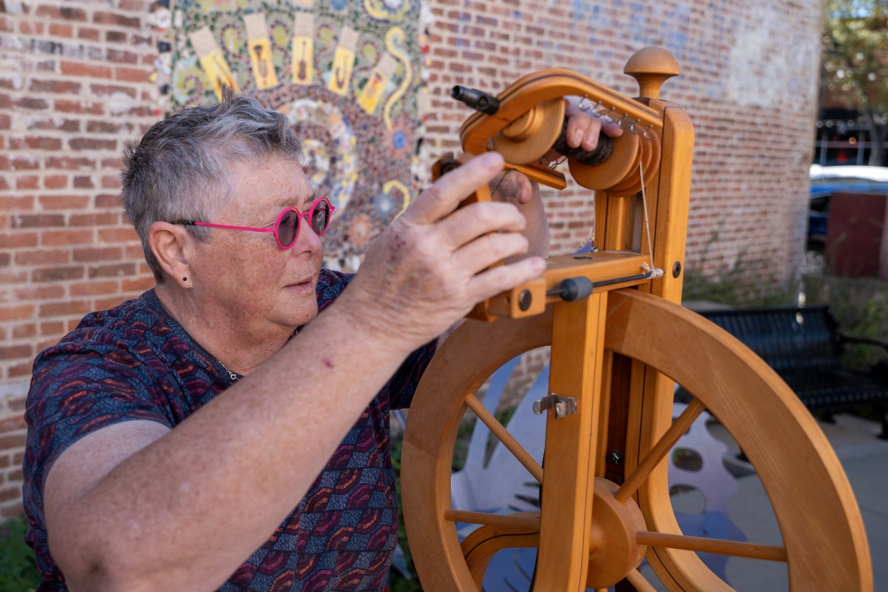 Cindy fixes a Matchless at Spinning & Weaving Week 2023