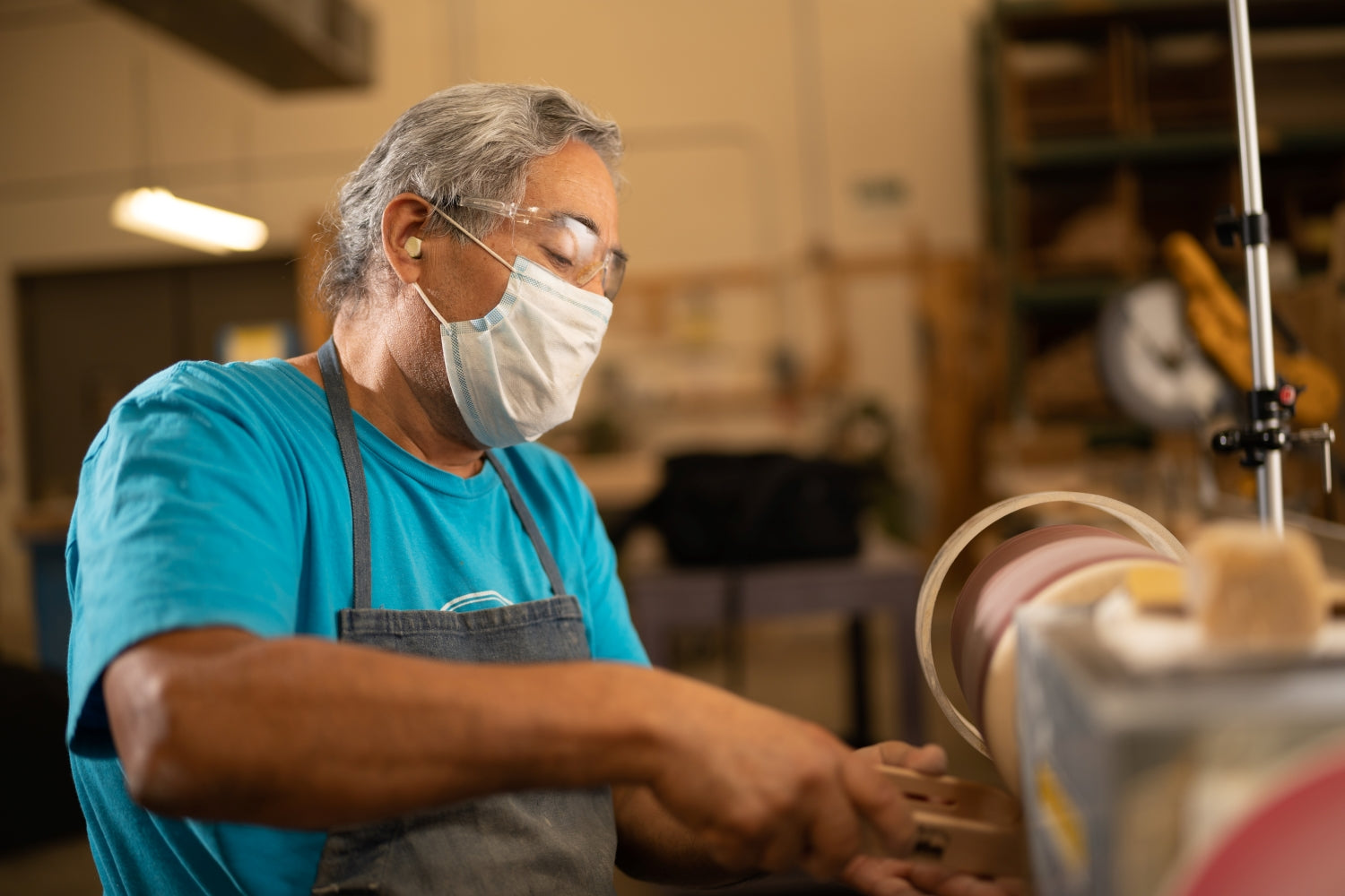sanding a boat shuttle