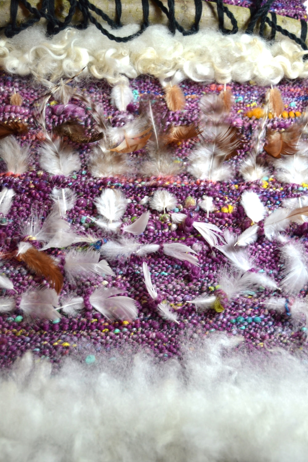 files/PROJ_Weaving_For_The_Birds_adding_feathers.jpg