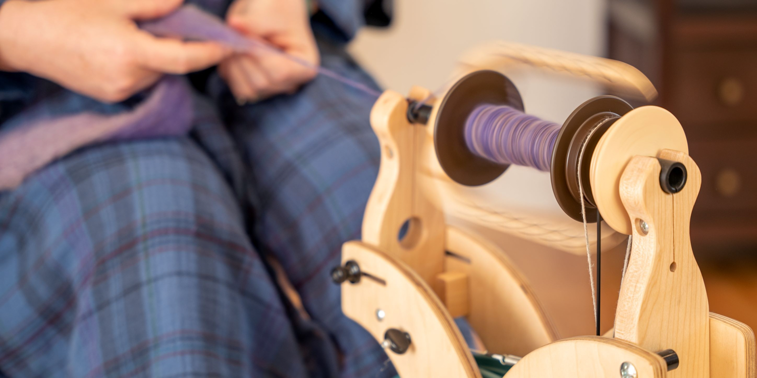 spinning yarn on a wheel